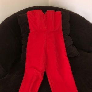 Red strapless jumpsuit, never worn. Size S